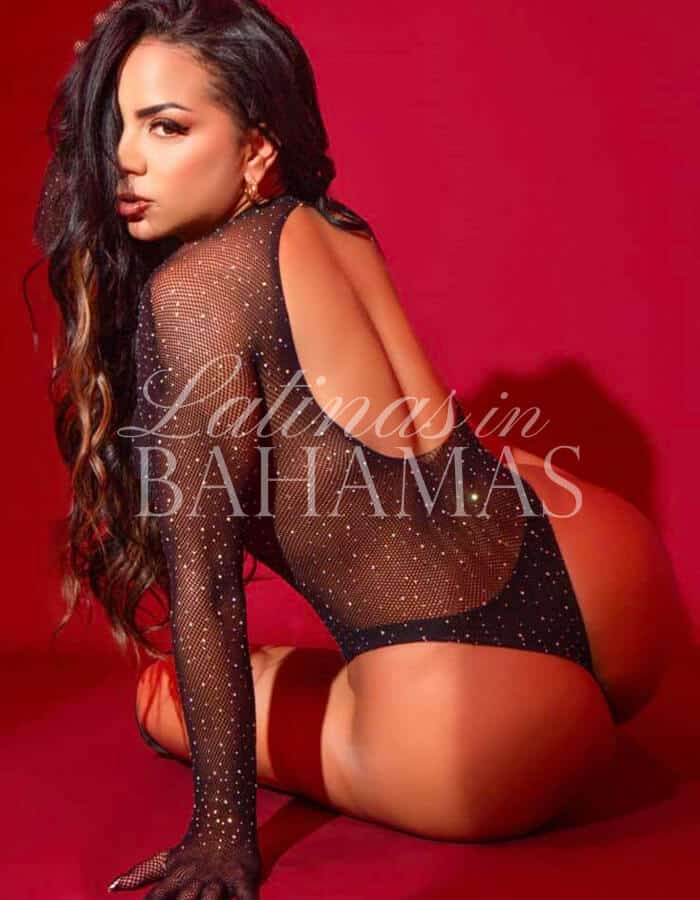 Confident beauty showcasing a glamorous and seductive look